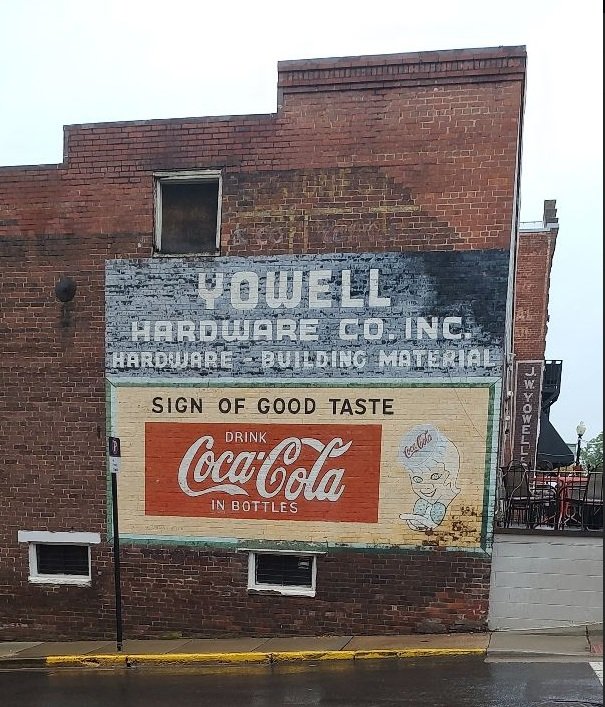 Powell Hardware and Coca-Cola sign