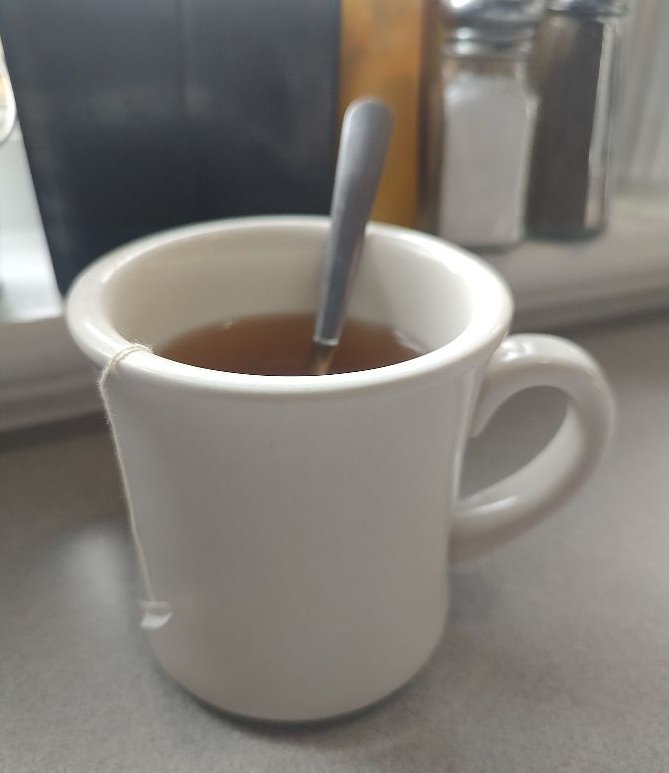 Coffee or tea mug on a diner counter